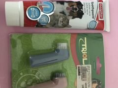 Зубная паста и щетка для животных