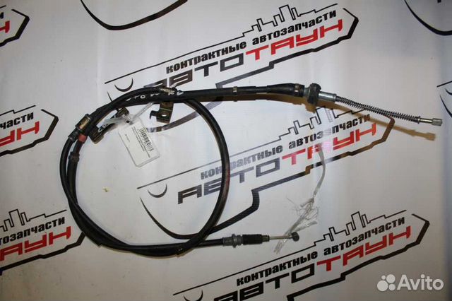 Тросик ручника mazda premacy CP8W cpew левый бараб