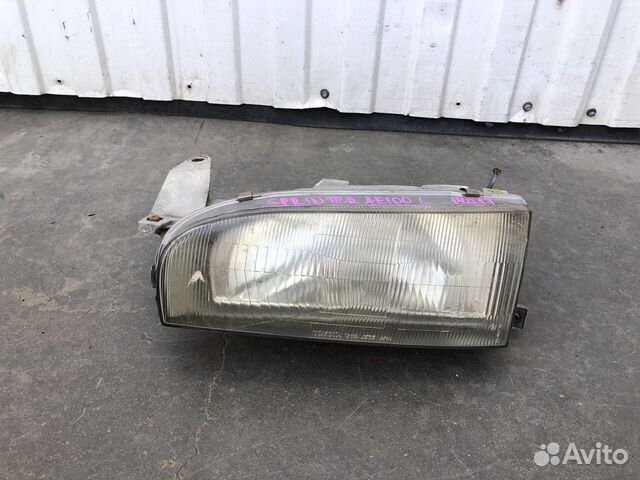 Фара левая Toyota Sprinter AE100