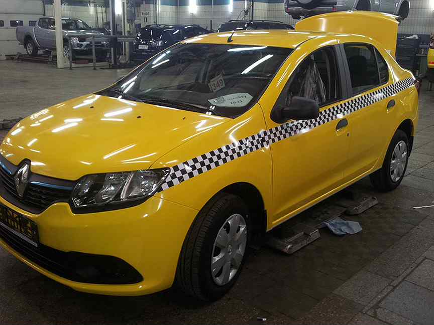 Таксопарк красногорск. Рено Логан 1 такси. Рено Логан желтый. Renault Logan 2011 Taxi. Логан 2 такси.