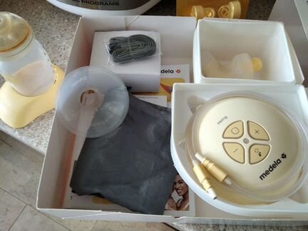 Молокоотсос Medela swing