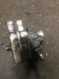 Кронштейн масленого фильтра Volkswagen 06A115417